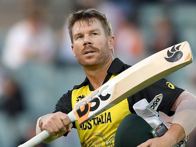 ADELAIDE, AUSTRALIA - NOVEMBER 04: David Warner of Australia reacts to losing his wicket during the ICC Men's T20 World Cup match between Australia and Afghanistan at Adelaide Oval on November 04, 2022 in Adelaide, Australia. (Photo by Mark Brake-ICC/ICC via Getty Images)