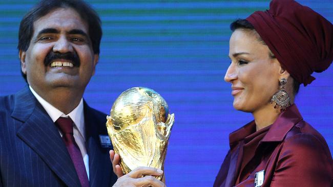 Sheikh Hamad bin Khalifa al-Thani and wife Sheikha Moza with the World Cup.