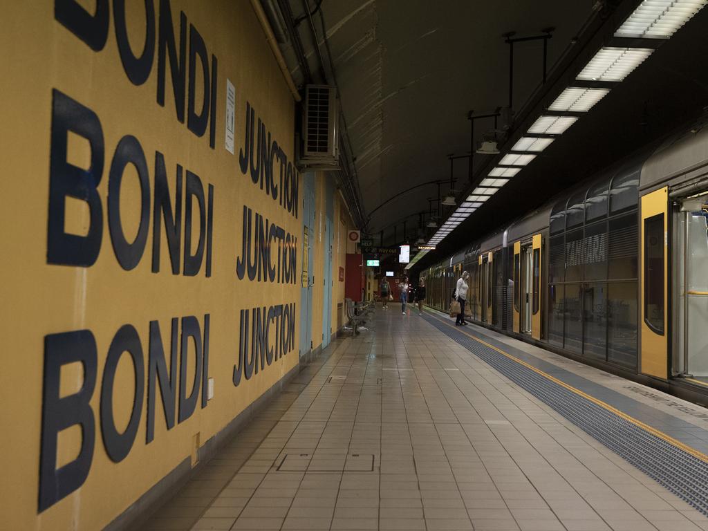 A passenger walks onto a train carriage at Bondi Junction in Sydney on Tuesday. Picture: Ryan Pierse/Getty Images