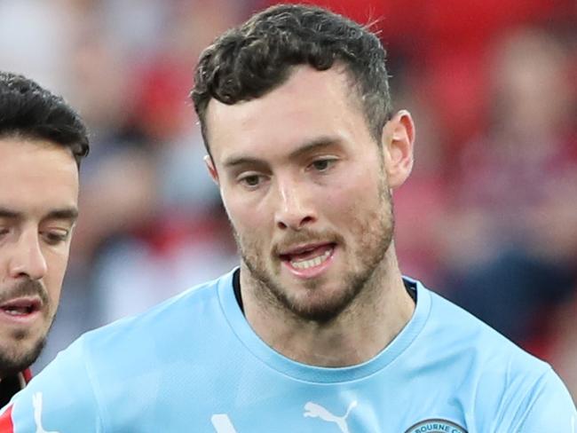 ADELAIDE, AUSTRALIA - MARCH 03: Aiden O'Neill of Melbourne City and  Zach Clough of Adelaide United during the round 19 A-League Men's match between Adelaide United and Melbourne City at Coopers Stadium, on March 03, 2023, in Adelaide, Australia. (Photo by Sarah Reed/Getty Images)