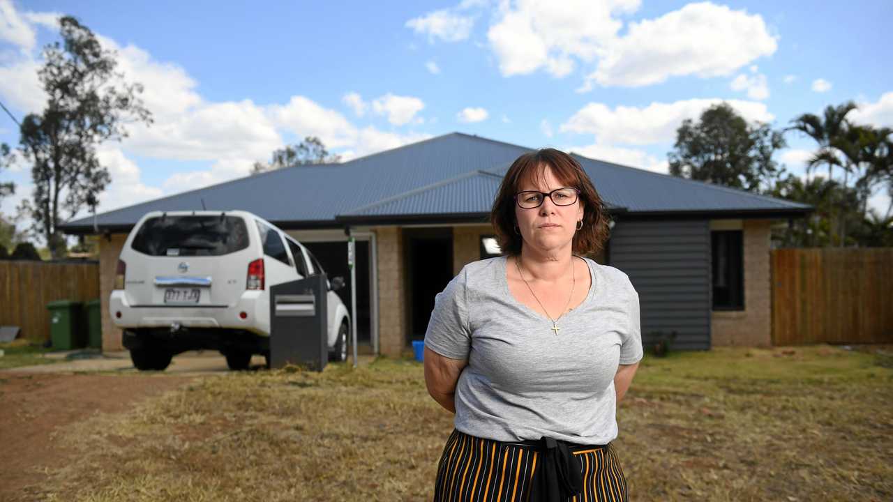 FED UP: Rachel Thorley and her partner moved into their newly built home at Fernvale a year ago. They have been left frustrated with a number of defects to the house and struggled to get help after G.J Gardner's North Ipswich franchise went bust in January. Picture: Rob Williams