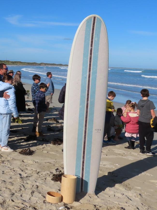 Hamish, Greg and Matt helped spread Sam’s ashes past the break at Beachport. Picture: Arj Ganesan