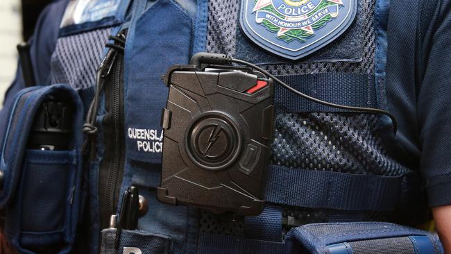 Body cameras, similar to this one worn by a Queensland police officer, will soon be worn by Victorian officers. Photo: Claudia Baxter