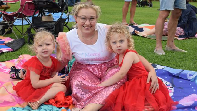 The Mills trio enjoy their time at the 2023 Buderim Community Carols.