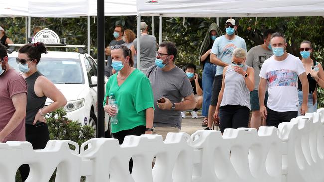 People queue in Brisbane to get tested for COVID-19. Picture: Liam Kidston.