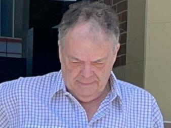 Andergrove man Phillip Williams (middle) leaves Mackay courthouse after pleading guilty to driving without due care and attention causing death over fatal crash that tragically claimed the life of his wife on August 5, 2022 at Anakie Siding. Picture: Janessa Ekert