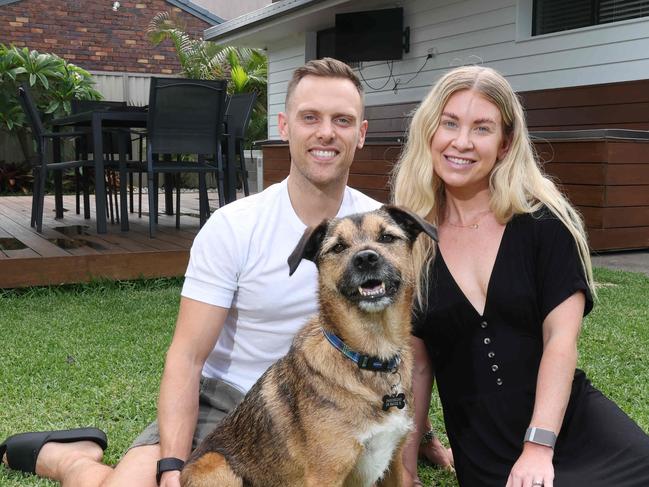 Ryan Davies and his wife Chloe Cowan, with their dog Hugo, have just moved to the Gold Coast from the UK and secured a rental at Burleigh Waters which attracted 100 applicants. Picture Glenn Hampson