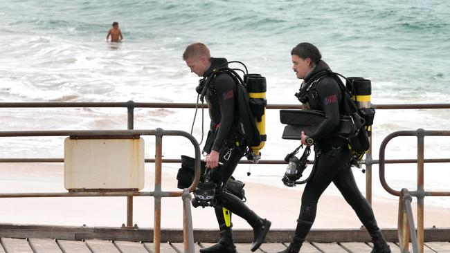 Police divers at Port Noarlunga Jetty. Picture: Dean Martin