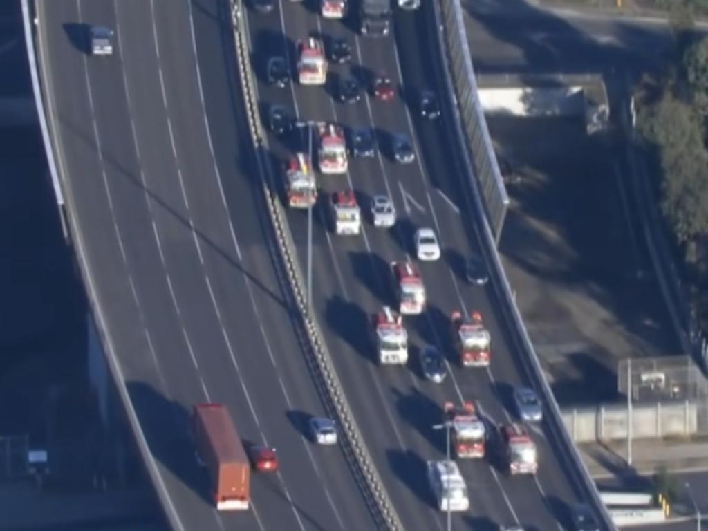 A convoy of CFA trucks makes its way to Victoria's parliament to protest the new emergency services levy on May 20. Picture: 9News