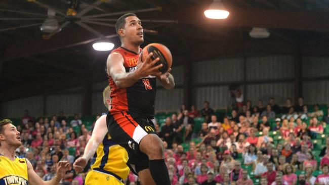 Mackay Meteors' Chris Cedar drives to the basket against the Townsville Heat in round 11 of the QBL at the Crater, Mackay on Saturday, July 8, 2018.