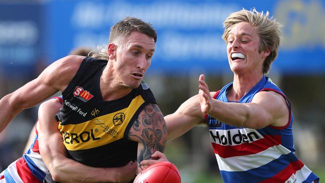 Central's Jackson Hately, right, tries to spoil Glenelg's Jesse White. Picture: Tait Schmaal