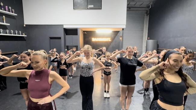 Singer Samantha Jade (left) and Shannon Riley (right) with pupils from Ms Riley's The Basement Dance Studios at Cromer, on Tuesday, August 20, 2024