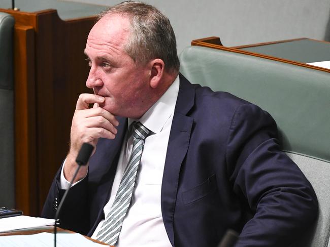 Nationals MP Barnaby Joyce reacts during debate in the House of Representatives at Parliament House in Canberra, Monday, February 24, 2020. (AAP Image/Lukas Coch) NO ARCHIVING