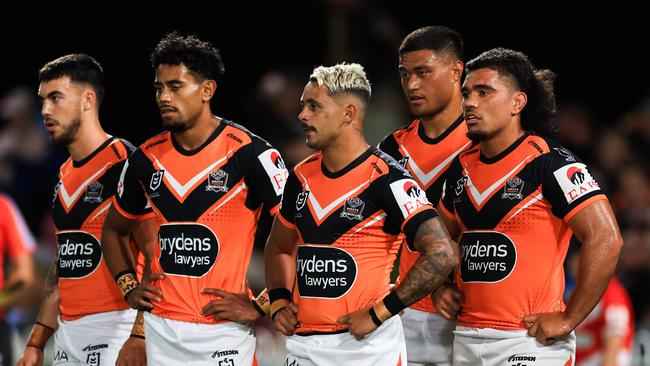 Wests Tigers look on after Dragons scored a try during the NRL Pre-season challenge match. (Photo by Mark Evans/Getty Images)