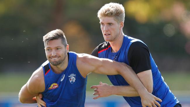 Tim English, right, working with new ruck partner Stefan Martin. Picture: Michael Willson/AFL Photos