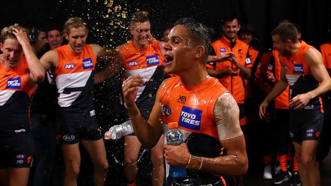 Young Giant Bobby Hill gets a Gatorade shower after his first AFL win. Picture: Getty Images