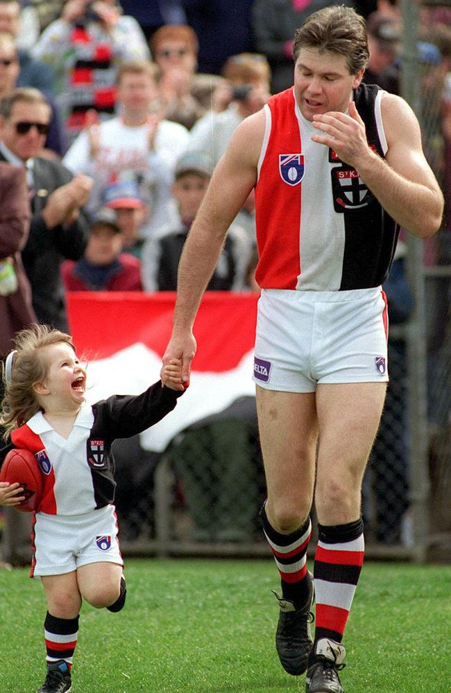 St Kilda's Danny Frawley wipes tears from his eyes as he runs out for his last game in 1995.