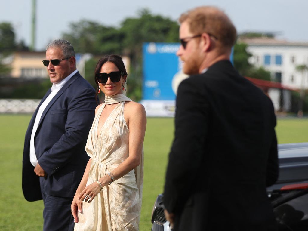 Meghan Markle with Prince Harry during their controversial trip to Nigeria. Picture: AFP