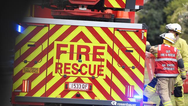 Fireys rescued a woman who was trapped in a vehicle in the Lockyer Valley region in the early hours on Wednesday. Picture: Kevin Farmer