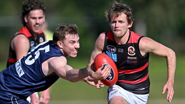 Old Melburnians Charles Lill and Old Xaverians William Hams during the VAFA football match between Old Melburnians and Old Xaverians in Brighton, Saturday, Aug. 20, 2022. Picture: Andy Brownbill