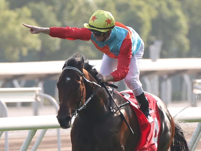 Jockey Zac Purton celebrates his victory aboard Ka Ying Rising at Sha Tin on Sunday. Picture: HKJC