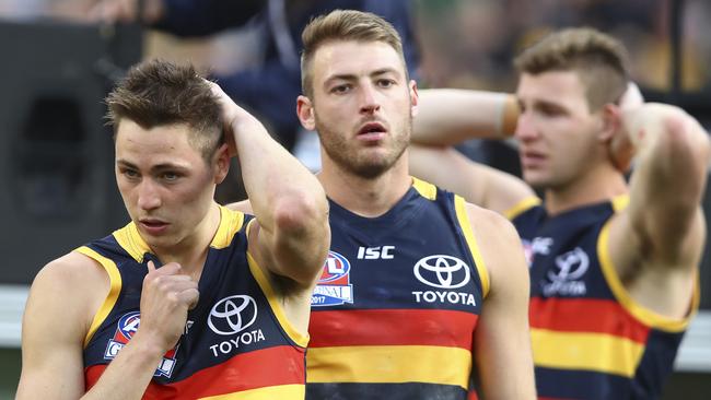 Jake Kelly, Daniel Talia and Josh Jenkins after the 2017 grand final loss. Picture: Sarah Reed