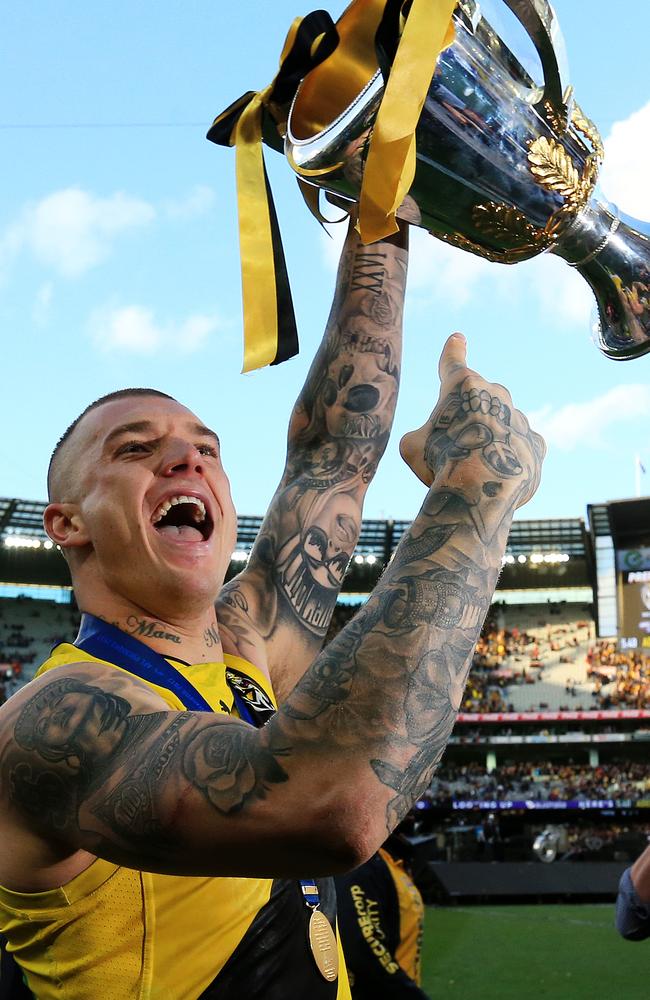 Dusty holds the Premiership aloft after the Tigers won the 2017 AFL Grand Final. Picture: Mark Stewart