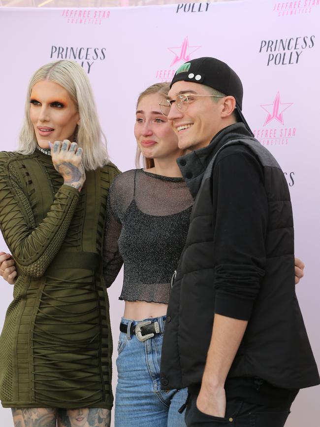 Beauty influencer Jeffree Star and emotional local fan Jemma Green, 17, of Mudgeeraba at Pacific Fair today. Thousands of fans turned out for the meet and greet. Picture Glenn Hampson