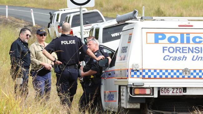 Police and ATSB investigators at the scene near Cedarton where two men were killed in a light plane crash. Picture: Lachie Millard