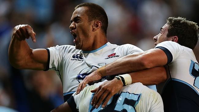 Waratahs winger Peter Betham celebrates a try by Alofa Alofa in the trial against the Auckland Blues.