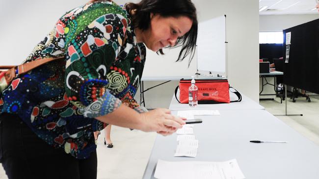 11th October 2020, Suzette Luyken candidate from the Legalise Cannabis Qld Party  inspects the Queensland State Election Ballot Draw for Gaven on the Gold Coast.Photo: Scott Powick News Corp