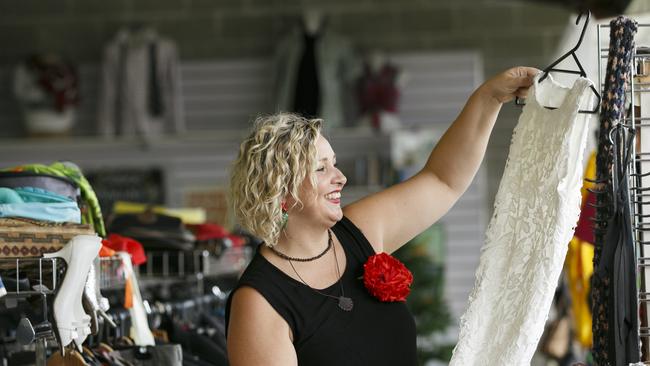 Juanita McMillan checks out a donated dress. Picture: Tim Pascoe