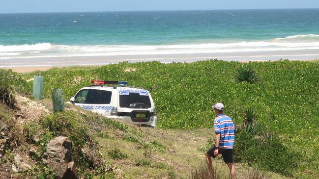 Emergency services are accessing the beach from the Look at Me Now headland. 