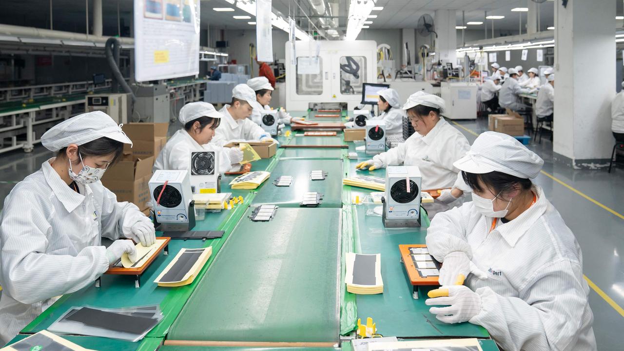 China is pushing modernisation which is expected to boost demand for lithium batteries like being made at this Nantong factory. Picture: AFP