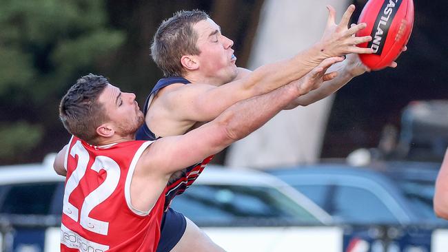 Josh Beasley (left) was best afield for Warrandyte. Picture: George Salpigtidis