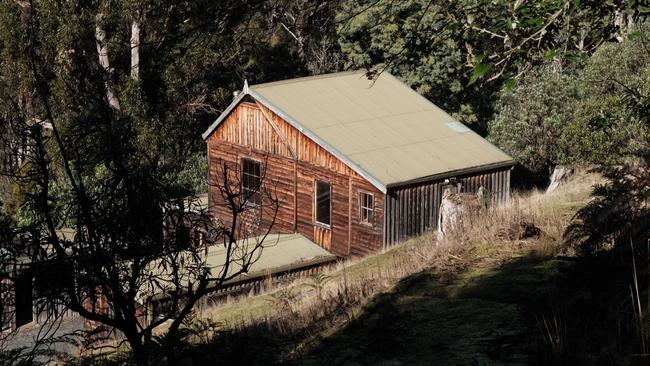 The rustic, cedar Provider House, in Lenah Valley, is surrounded by a peaceful, native bush setting. Picture: Supplied