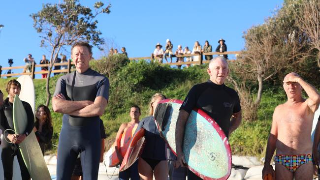 Members of the public took part in a paddle-out at Byron Bay's Main Beach to protest against the planned Netflix reality show Byron Baes on the morning of Tuesday, April 20, 2021. Picture: Liana Boss