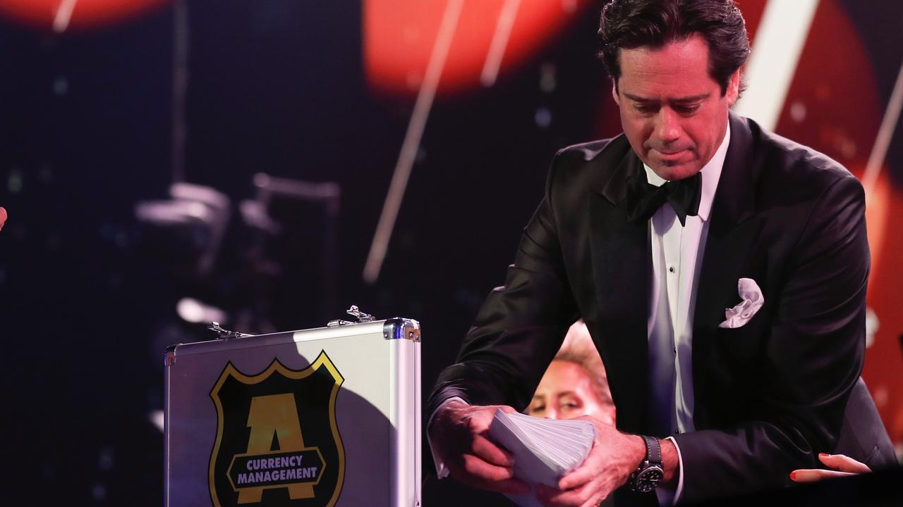 AFL chief Gil McLachlan receiving the votes on awards night. Picture: Getty Images