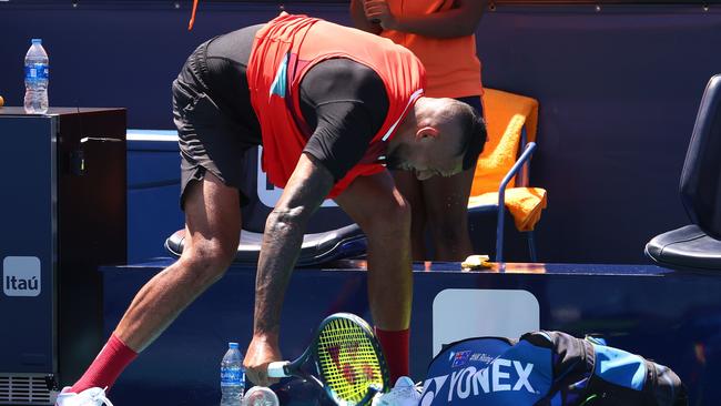 MIAMI GARDENS, FLORIDA – MARCH 29: Nick Kyrgios of Australia slams his racket in his match against Jannik Sinner of Italy during the Miami Open at Hard Rock Stadium on March 29, 2022 in Miami Gardens, Florida. Michael Reaves/Getty Images/AFP == FOR NEWSPAPERS, INTERNET, TELCOS &amp; TELEVISION USE ONLY ==