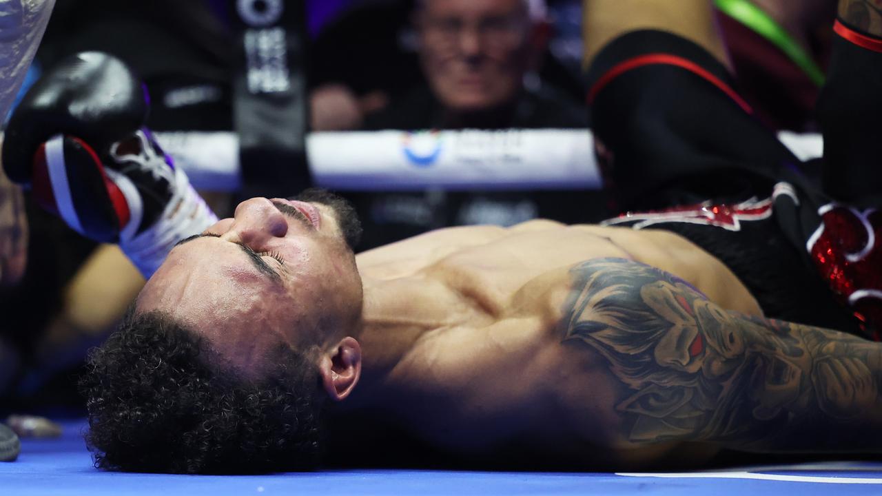 RIYADH, SAUDI ARABIA - OCTOBER 12: Ben Whittaker reacts after falling out of the ring with Liam Cameron during a clinch during the Light Heavyweight fight between Ben Whittaker and Liam Cameron as part of the Riyadh Season - IV Crown Showdown card at Kingdom Arena on October 12, 2024 in Riyadh. (Photo by Richard Pelham/Getty Images)