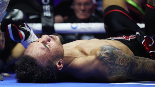 RIYADH, SAUDI ARABIA - OCTOBER 12: Ben Whittaker reacts after falling out of the ring with Liam Cameron during a clinch during the Light Heavyweight fight between Ben Whittaker and Liam Cameron as part of the Riyadh Season - IV Crown Showdown card at Kingdom Arena on October 12, 2024 in Riyadh. (Photo by Richard Pelham/Getty Images)