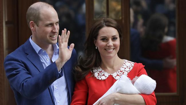 William and Kate pose with their newborn baby son as they leave the Lindo wing at St Mary's Hospital in London. Picture: AFP.