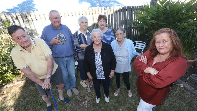 Donna Hunter (brown shirt) and her neighbours L-R David Holmberg, Colin Paterson, Beryl Crewlson, Glennis Furness, Betty Whittaker and Jen Johnston who are sick and tired of being kept awake due to the thumping from the music in a gym recently opened beside their townhouses. Picture Mike Batterham