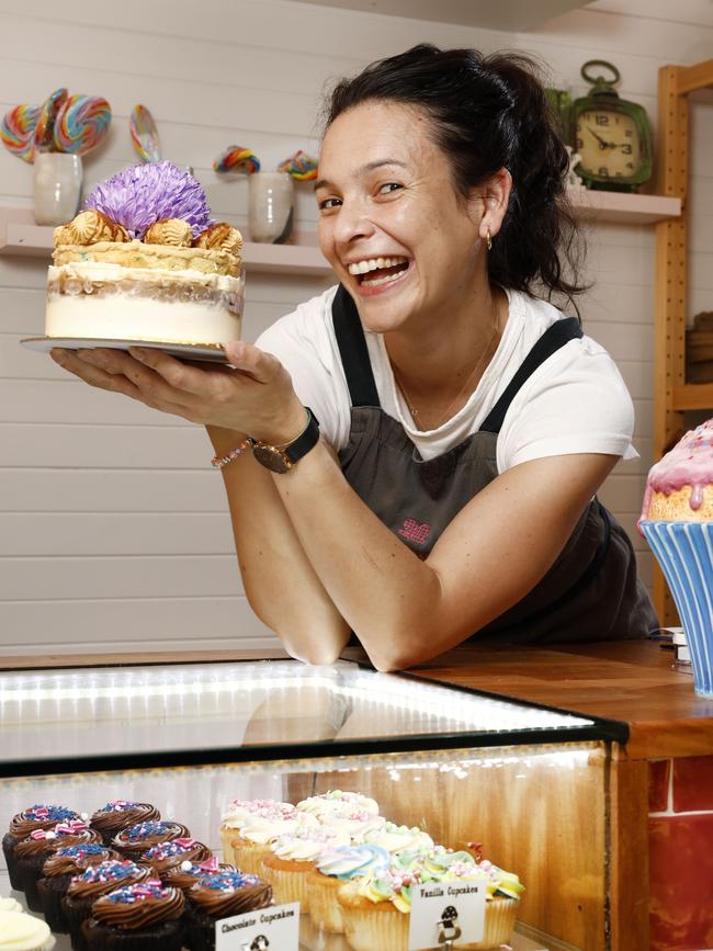 Baker Gabriela Oporto at Bakealicious in Forestville holding the Eras Cake. Picture: Richard Dobson