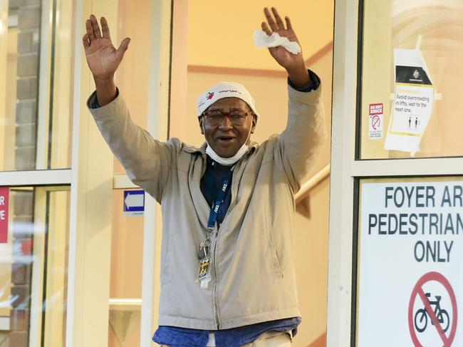 A resident waves from the front door. Picture: Getty Images