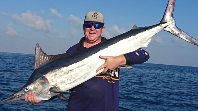 Ben Judd with his black marlin