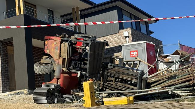 A man was taken to hospital after a forklift tipped at a construction site in Mount Duneed. Photo: Alison Wynd.