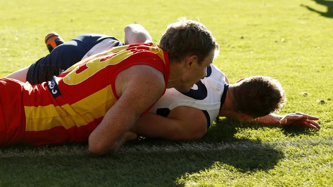 Gold Coast’s Nick Holman is challenging a two-week suspension for this tackle that left Geelong’s Mitch Duncan concussed. Picture: AFL Photos/via Getty Images)