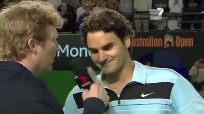 Federer and Courier share a laugh