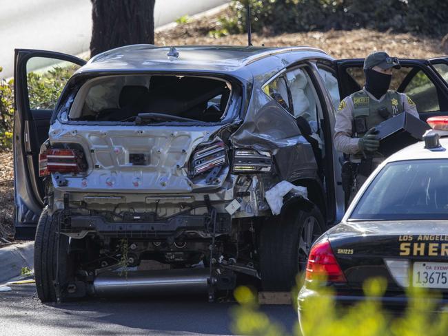 The back of the SUV was all banged up.